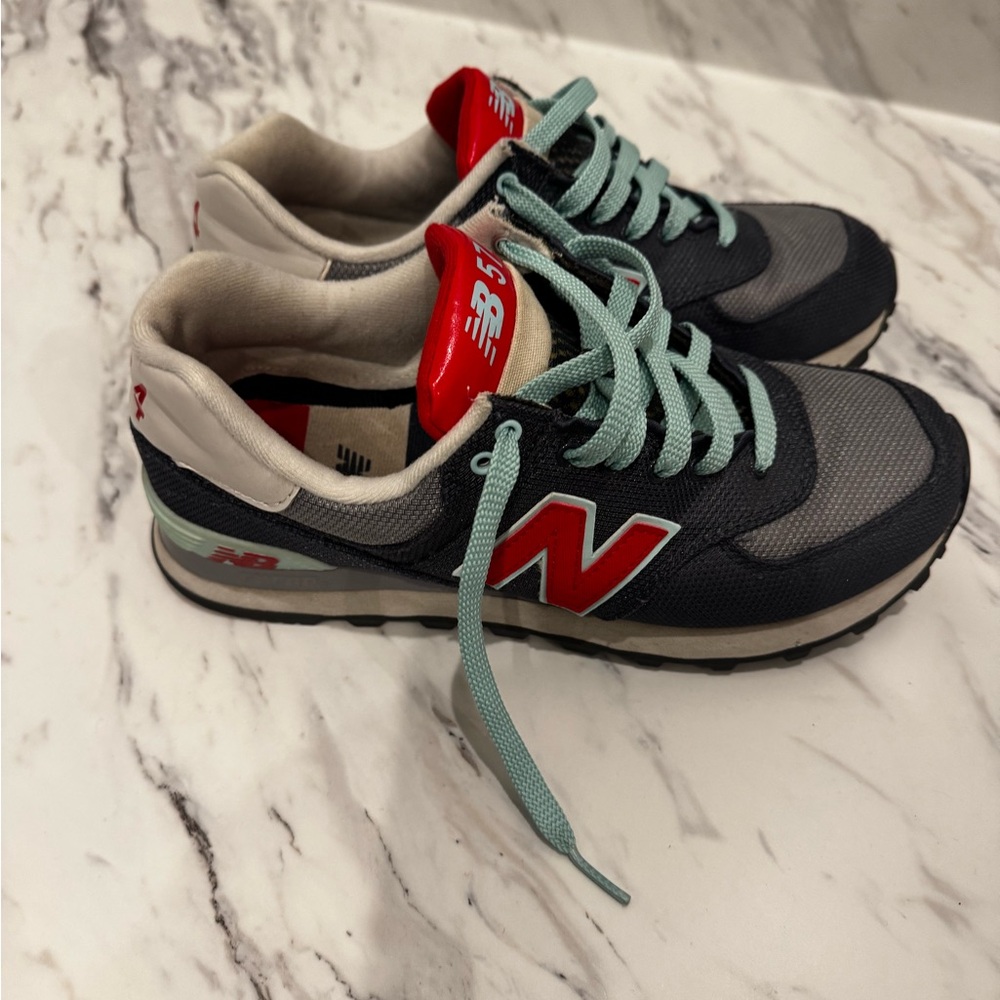 New Balance Black and Red Sneakers with Teal Accents